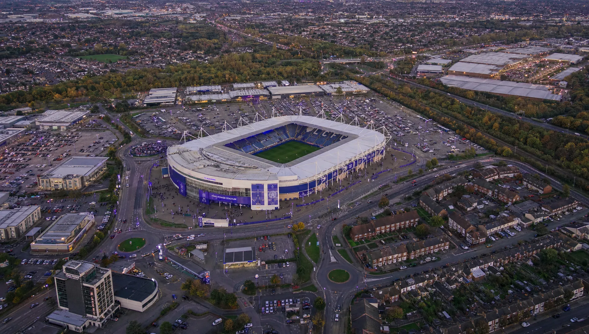 A football stadium surrounded by roads, car parks and nearby streets, showing the area covered by FAA drone restrictions.
